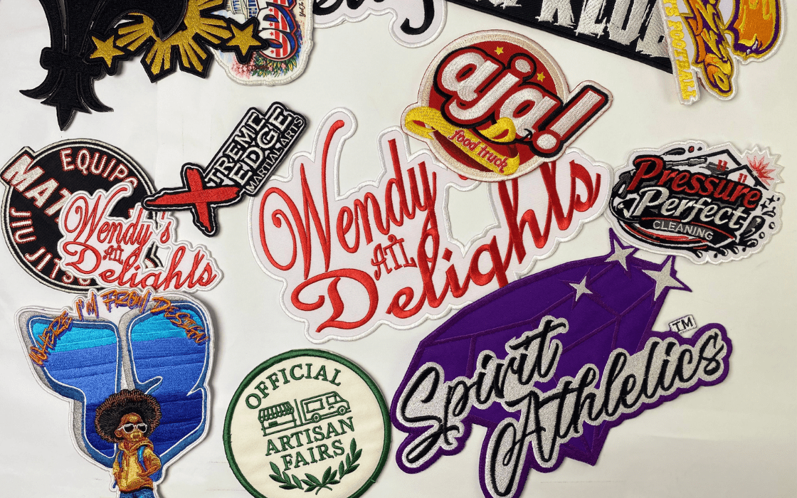 Patches being applied to a denim jacket